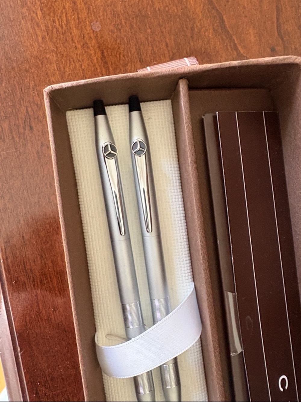 Cross Apogee “Frosty Steel” pen and pencil set with Mercedes logo clips.
